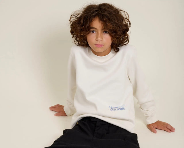 Pull-over à col roulé blanc avec logo « lemon marseille ».